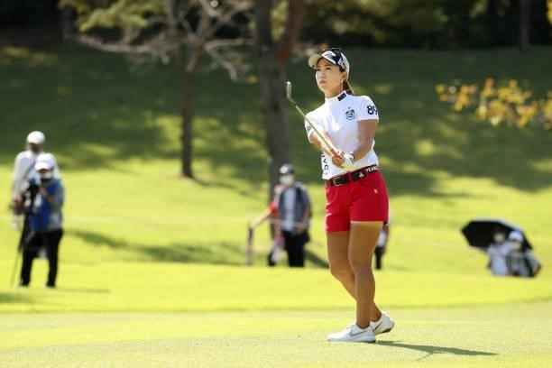 Momoko Ueda of Japan hits her third shot on the 5th hole during the final round of the 54th Japan Women's Open Golf Championship at Karasuyamajo...
