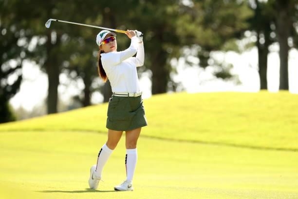 Minami Katsu of Japan hits her second shot on the 6th hole during the final round of the 54th Japan Women's Open Golf Championship at Karasuyamajo...