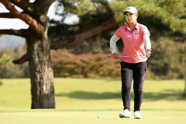 Mao Saigo of Japan lines up a putt on the 6th green during the final round of the 54th Japan Women's Open Golf Championship at Karasuyamajo Country...