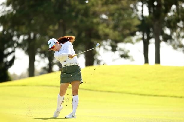 Minami Katsu of Japan hits her second shot on the 6th hole during the final round of the 54th Japan Women's Open Golf Championship at Karasuyamajo...