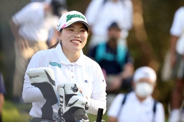 Minami Katsu of Japan smiles on the 14th tee during the final round of the 54th Japan Women's Open Golf Championship at Karasuyamajo Country Club on...