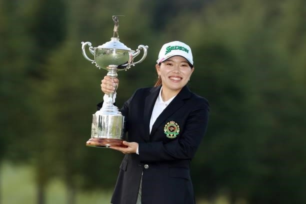 Minami Katsu of Japan poses with the trophy after winning the tournament following the final round of the 54th Japan Women's Open Golf Championship...