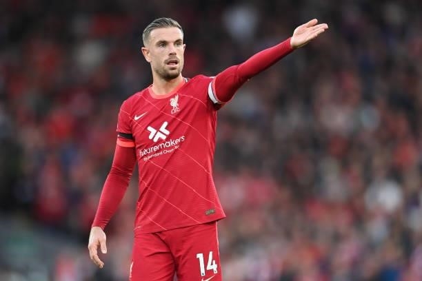 Jordan Henderson of Liverpool looks on during the Premier League match between Liverpool and Manchester City at Anfield on October 03, 2021 in...