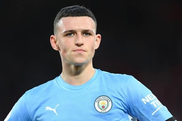 Phil Foden of Manchester City looks on during the Premier League match between Liverpool and Manchester City at Anfield on October 03, 2021 in...