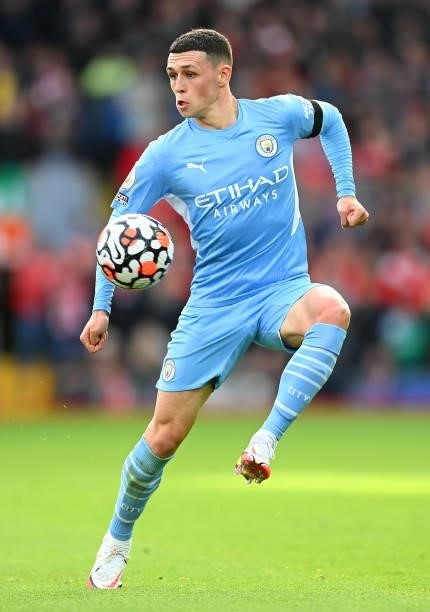 Phil Foden of Manchester City in action during the Premier League match between Liverpool and Manchester City at Anfield on October 03, 2021 in...