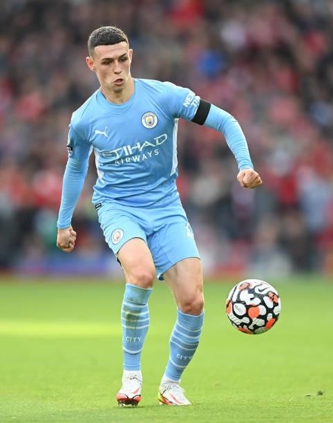 Phil Foden of Manchester City in action during the Premier League match between Liverpool and Manchester City at Anfield on October 03, 2021 in...