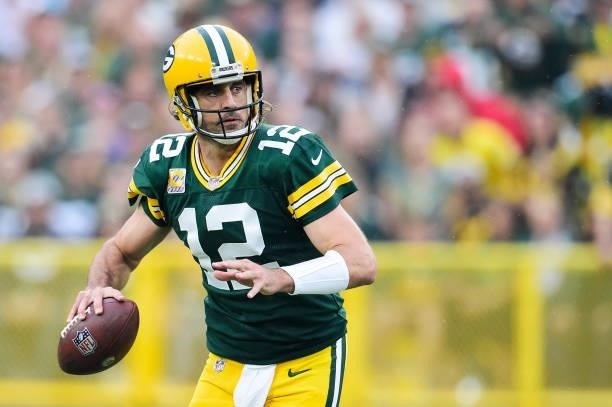 Aaron Rodgers of the Green Bay Packers looks to throw the ball in the first half against the Pittsburgh Steelers at Lambeau Field on October 03, 2021...