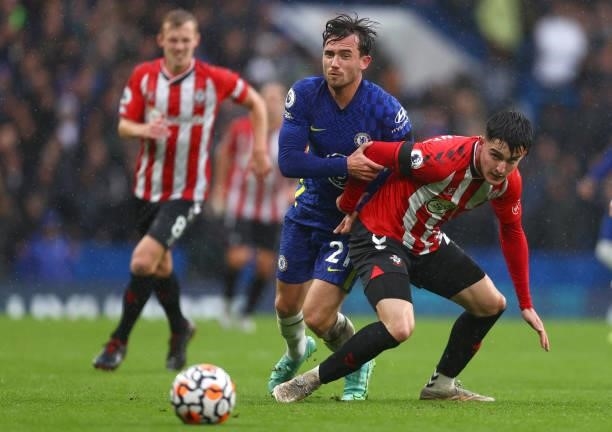 Ben Chilwell of Chelsea battles for possession with Valentino Livramento of Southampton during the Premier League match between Chelsea and...