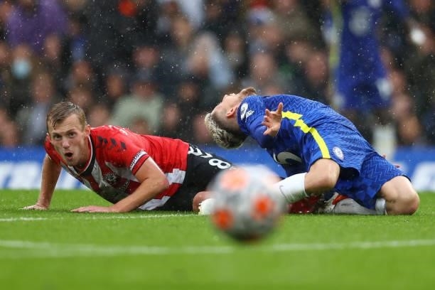James Ward-Prowse of Southampton fouls Jorginho of Chelsea leading to a red card being awarded during the Premier League match between Chelsea and...