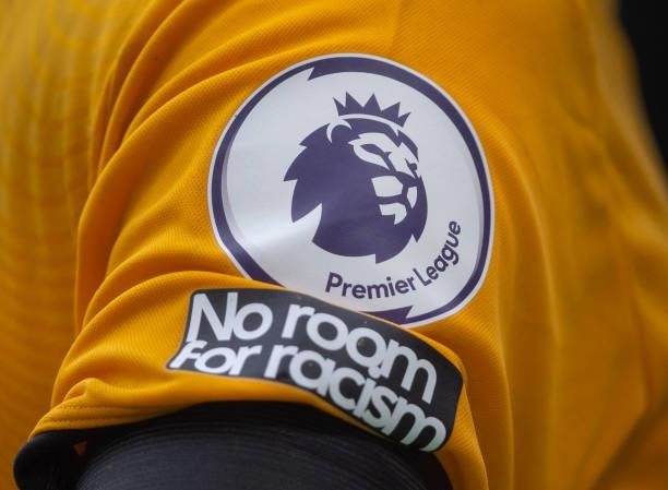 The official English Premier League logo above the NO ROOM FOR RACISM slogan on the sleeve of a Wolverhampton Wanderers player after the Premier...