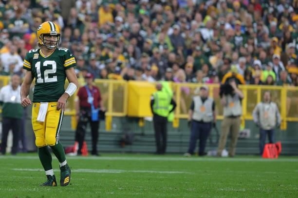 Aaron Rodgers of the Green Bay Packers looks to the Pittsburgh Steelers sideline during a game at Lambeau Field on October 03, 2021 in Green Bay,...