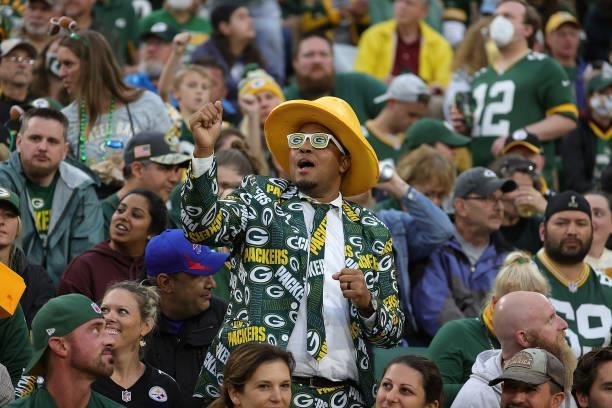 Fan of the Green Bay Packers cheers during a game against the Pittsburgh Steelers at Lambeau Field on October 03, 2021 in Green Bay, Wisconsin.