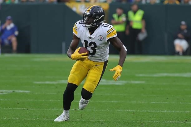 James Washington of the Pittsburgh Steelers runs for yards after a catch during a game against the Green Bay Packers at Lambeau Field on October 03,...