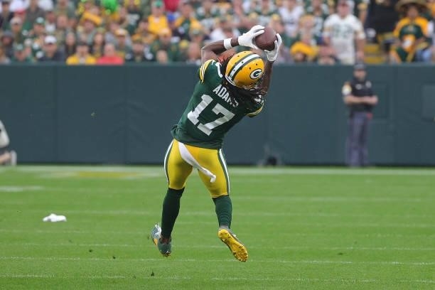 Davante Adams of the Green Bay Packers catches a pass during a game against the Pittsburgh Steelers at Lambeau Field on October 03, 2021 in Green...