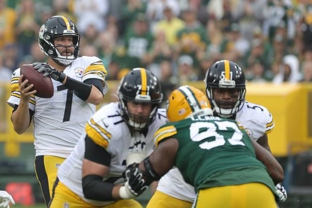Ben Roethlisberger of the Pittsburgh Steelers drops back to pass during a game against the Green Bay Packers at Lambeau Field on October 03, 2021 in...