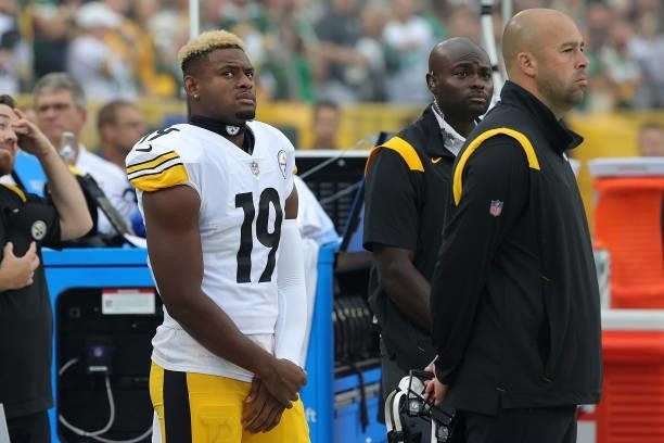 JuJu Smith-Schuster of the Pittsburgh Steelers stands for the National Anthem prior to a game against the Green Bay Packers at Lambeau Field on...