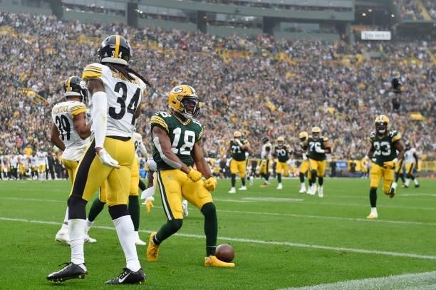 Randall Cobb of the Green Bay Packers celebrates with teammates after scoring a touchdown during the second quarter against the Pittsburgh Steelers...