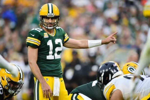 Aaron Rodgers of the Green Bay Packers stands under center in the second half against the Pittsburgh Steelers at Lambeau Field on October 03, 2021 in...