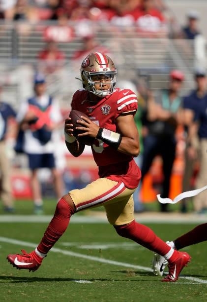 Trey Lance of the San Francisco 49ers drops back to pass during the third quarter against the Seattle Seahawks at Levi's Stadium on October 03, 2021...