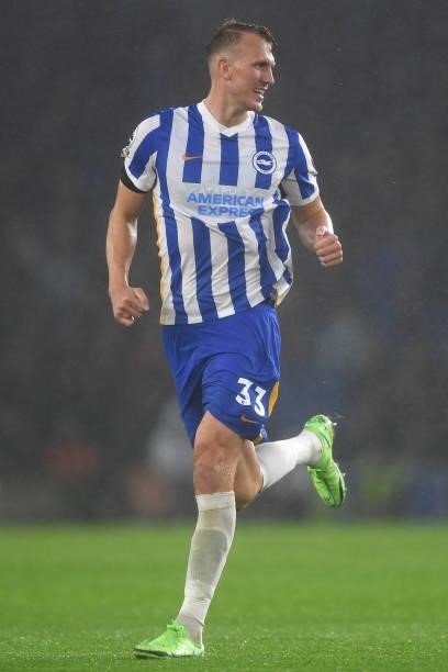 Dan Burn of Brighton and Hove Albion runs on during the Premier League match between Brighton & Hove Albion and Arsenal at American Express Community...