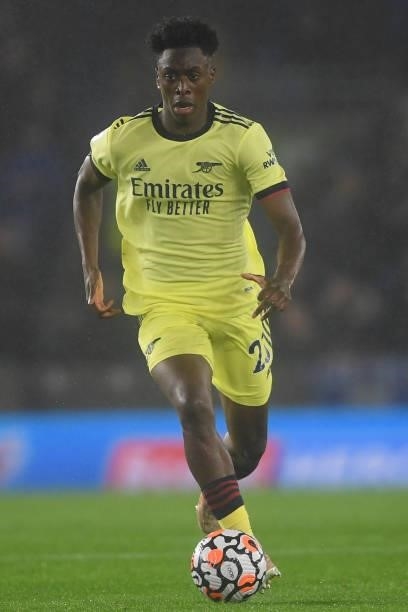Albert Sambi Lokonga of Arsenal runs with the ball during the Premier League match between Brighton & Hove Albion and Arsenal at American Express...