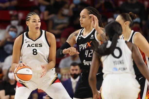 Liz Cambage of the Las Vegas Aces looks to pass during Game Three of the 2021 WNBA semifinals at Desert Financial Arena on October 03, 2021 in Tempe,...