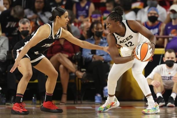 Chelsea Gray of the Las Vegas Aces handles the ball against Skylar Diggins-Smith of the Phoenix Mercury during Game Three of the 2021 WNBA semifinals...