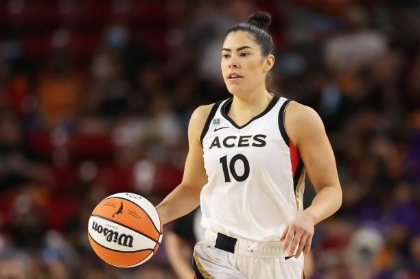 Kelsey Plum of the Las Vegas Aces handles the ball during Game Three of the 2021 WNBA semifinals at Desert Financial Arena on October 03, 2021 in...