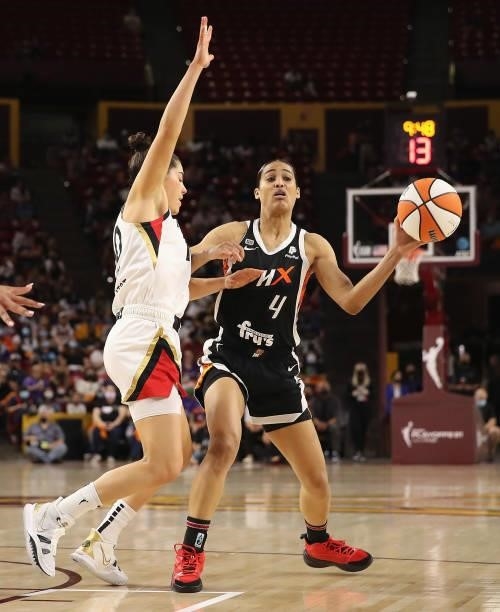 Skylar Diggins-Smith of the Phoenix Mercury looks to pass against Kelsey Plum of the Las Vegas Aces during Game Three of the 2021 WNBA semifinals at...
