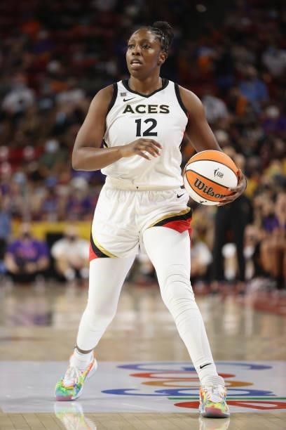 Chelsea Gray of the Las Vegas Aces handles the ball during Game Three of the 2021 WNBA semifinals at Desert Financial Arena on October 03, 2021 in...