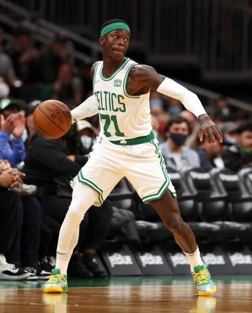 Dennis Schroder of the Boston Celtics makes a pass against the Orlando Magic during the first quarter of the preseason game at TD Garden on October...