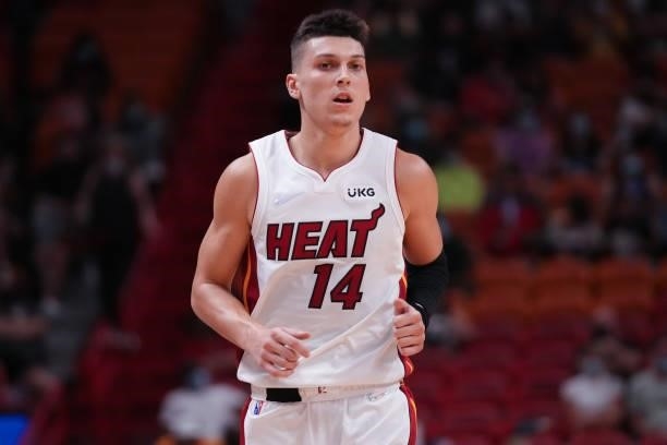Tyler Herro of the Miami Heat runs back to play defense against the Atlanta Hawks in the third quarter of preseason action at FTX Arena on October...