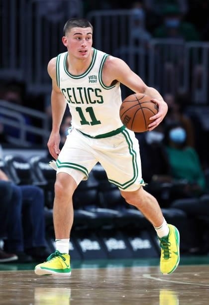 Payton Pritchard of the Boston Celtics dribbles against the Orlando Magic during the second half of the preseason game at TD Garden on October 04,...
