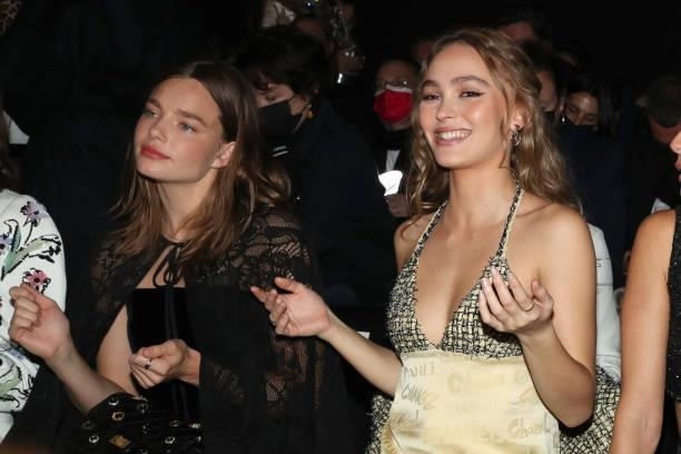 Kristine Froseth and Lily-Rose Depp attend the Chanel Womenswear Spring/Summer 2022 show as part of Paris Fashion Week on October 05, 2021 in Paris,...