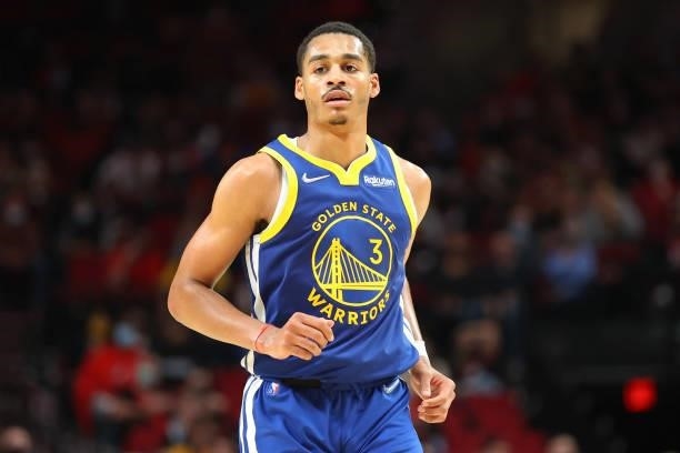 Jordan Poole of the Golden State Warriors looks on against the Portland Trail Blazers in the third quarter during the preseason game at Moda Center...