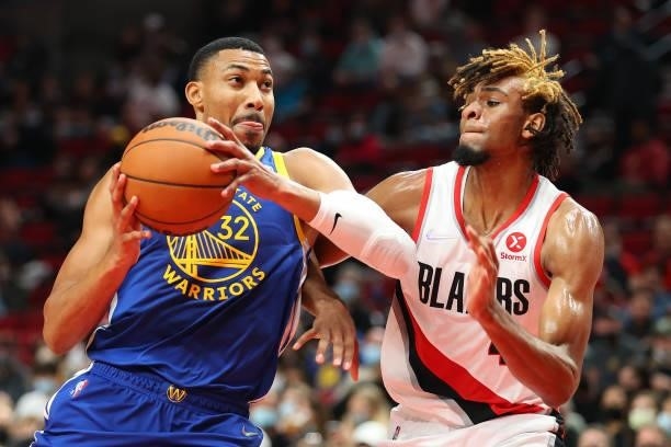 Otto Porter Jr. #32 of the Golden State Warriors works towards the basket against Greg Brown III of the Portland Trail Blazers in the third quarter...
