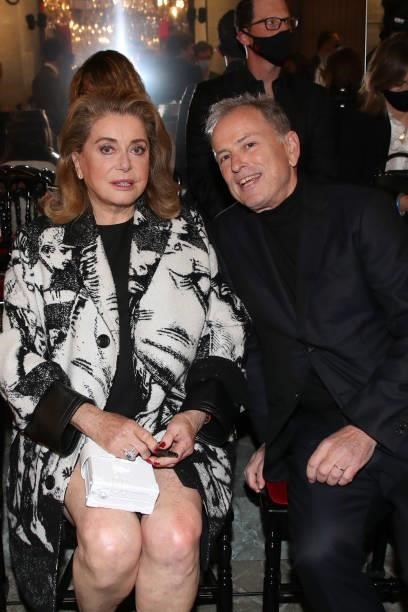 Catherine Deneuve and CEO of Louis Vuitton Michael Burke attend the Louis Vuitton Womenswear Spring/Summer 2022 show as part of Paris Fashion Week on...