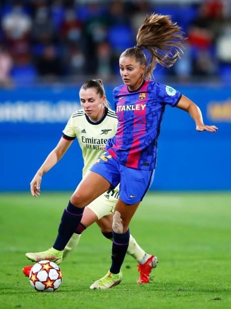 Lieke Martens of FC Barcelona is tackled by Noelle Maritz of Arsenal WFC during the UEFA Women's Champions League group C match between FC Barcelona...