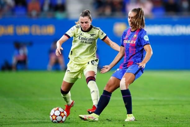 Lieke Martens of FC Barcelona is tackled by Noelle Maritz of Arsenal WFC during the UEFA Women's Champions League group C match between FC Barcelona...