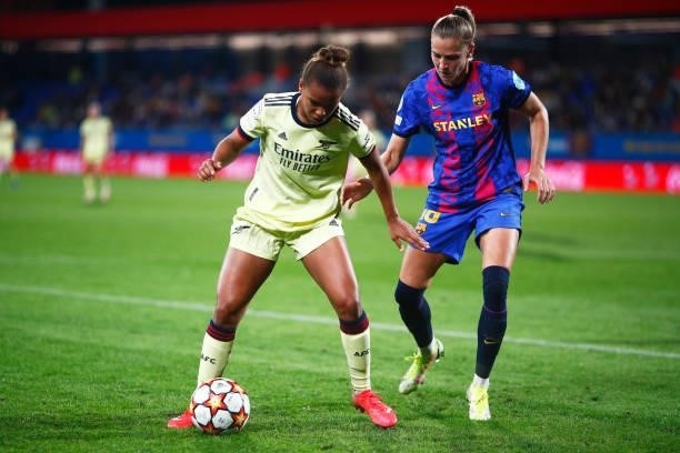 Nikita Parris of Arsenal WFC is tackled by Ana-Maria Crnogorcevic of FC Barcelona during the UEFA Women's Champions League group C match between FC...