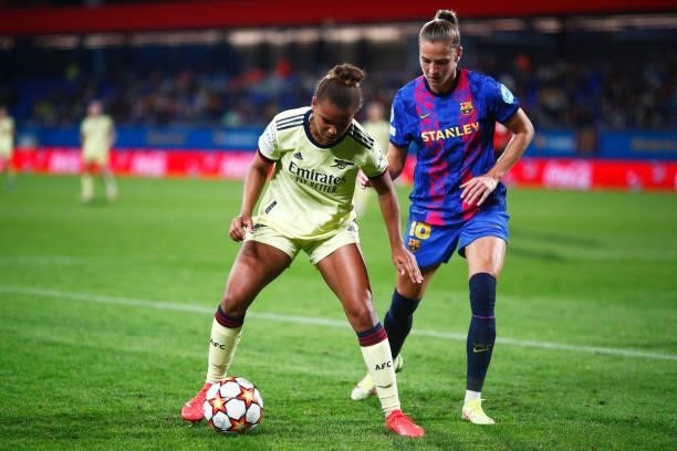 Nikita Parris of Arsenal WFC is tackled by Ana-Maria Crnogorcevic of FC Barcelona during the UEFA Women's Champions League group C match between FC...