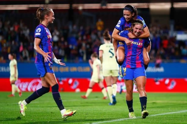 Mariona Caldentey of FC Barcelona celebrates scoring his side's first goal with Aitana Bonmati and Caroline Graham Hansen FC Barcelona during the...