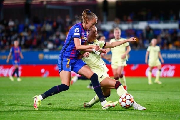 Caroline Graham Hansen of FC Barcelona is tackled by Steph Catley of Arsenal during the UEFA Women's Champions League group C match between FC...