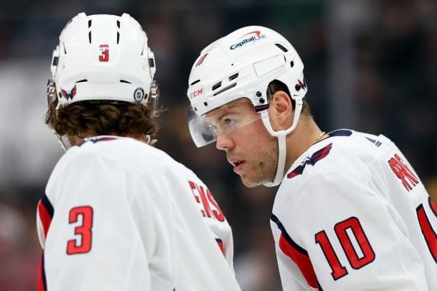 Daniel Sprong of the Washington Capitals talks with Nick Jensen during the first period of the preseason game against the Boston Bruins at TD Garden...