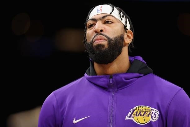 Anthony Davis of the Los Angeles Lakers stands on the court during the first half of the NBA preseason game against the Phoenix Suns at Footprint...