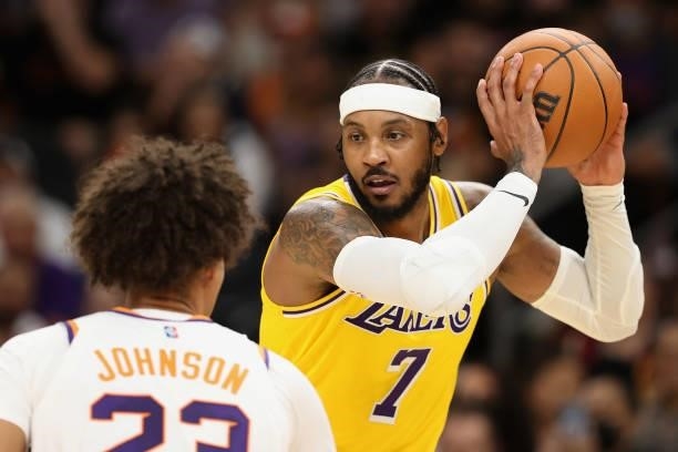 Carmelo Anthony of the Los Angeles Lakers handles the ball during the first half of the NBA preseason game against the Phoenix Suns at Footprint...