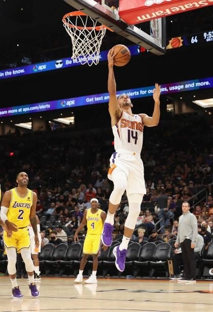 Landry Shamet of the Phoenix Suns lays up a shot against the Los Angeles Lakers during the NBA preseason game at Footprint Center on October 06, 2021...