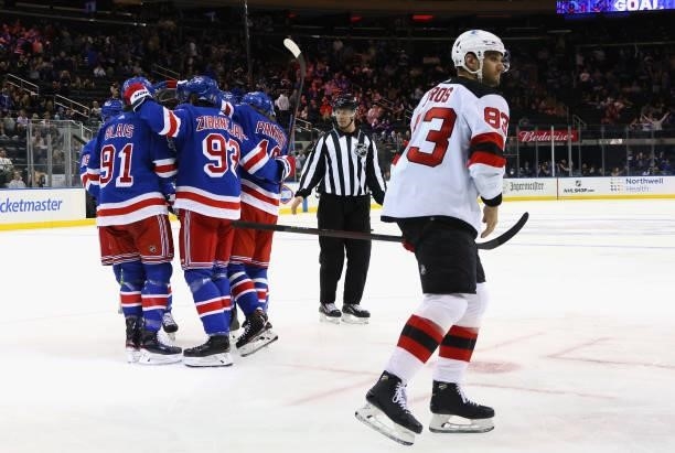 The New York Rangers celebrate a second period goal by Mika Zibanejad against the New Jersey Devils during a preseason game at Madison Square Garden...
