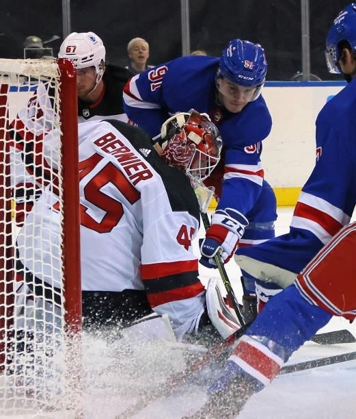 Sammy Blais of the New York Rangers scores a second period goal against Jonathan Bernier of the New Jersey Devils during a preseason game at Madison...
