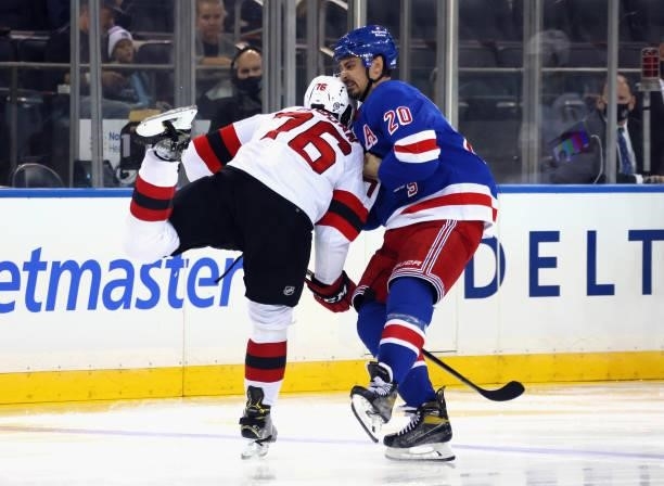Chris Kreider of the New York Rangers starts the second period by going after P.K. Subban of the New Jersey Devils for his first period hit on Ryan...